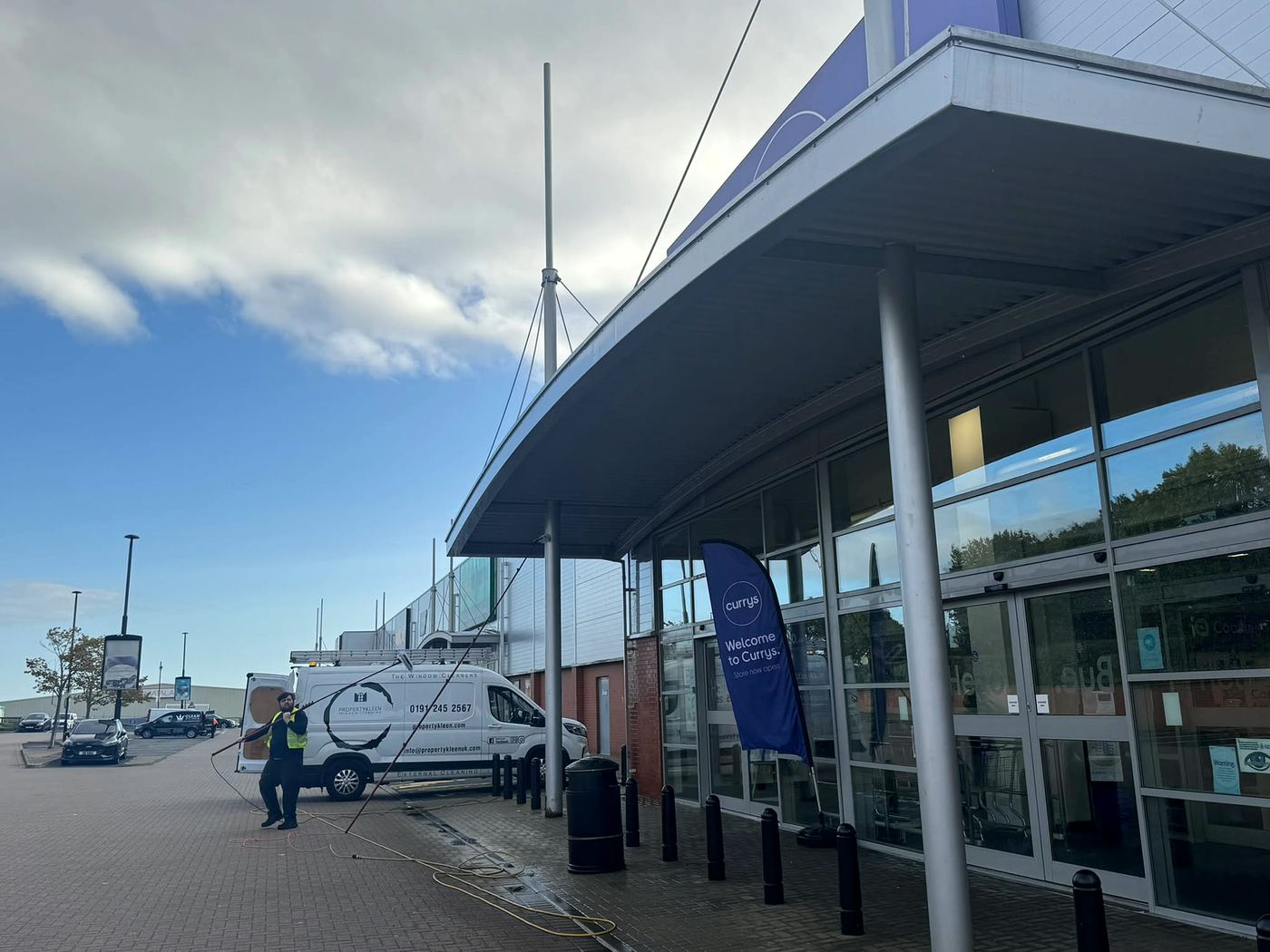 PropertyKleen cleaning the entrance glazing at Currys