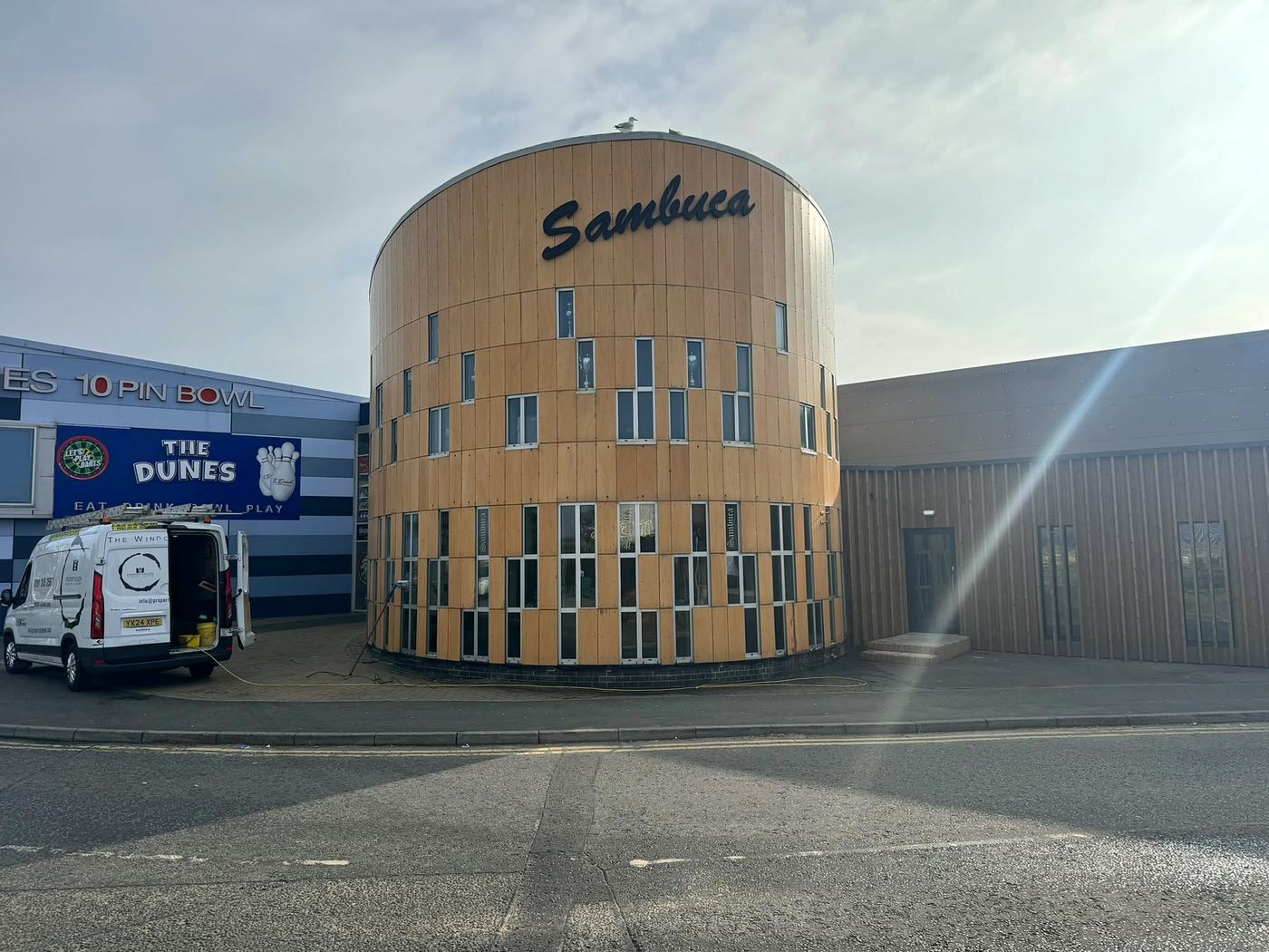 PropertyKleen cleaning the windows and cladding at Sambuca